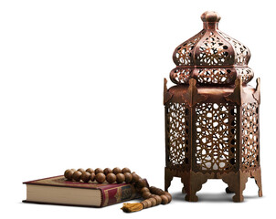 Islamic Holy Book Quran with rosary beads and ornamental arabic lantern