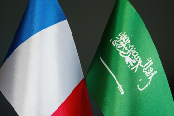 Close-up of the flags of France and Saudi Arabia.