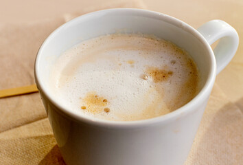 Fresh Latte Espuma in White Cap, Cappuccino in Coffeeshop, Milk Coffee with Gentle Foam