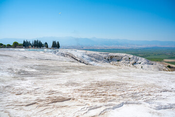 Calcite cliff of Pamukkale, white travertines in Turkey