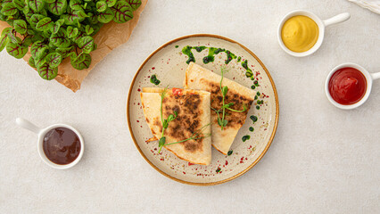 Portion of gourmet appetizer quesadilla with chicken