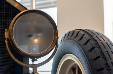 retro car wheel and headlight