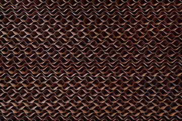 The honeycomb-designed cardboard background is part of the ventilation and cooling system thanks to...
