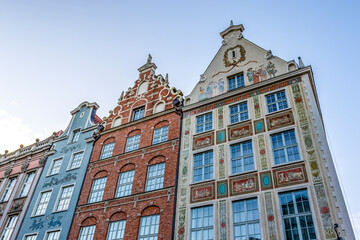 Fototapeta na wymiar Facades of colorful historical merchant houses in the center of Gdansk, Poland, Europe