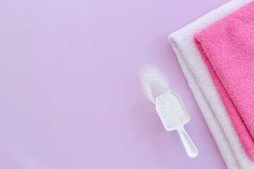 Laundry detergents powder with scoop and fresh towels
