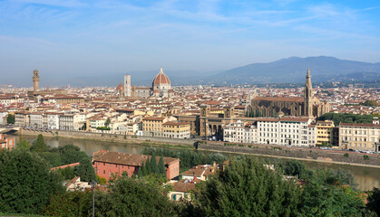 city scape of world heritage city of Florence in Tuscany, Italy with Dome and river Arno