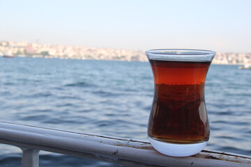 glass of beer on the beach