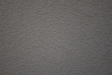 The texture of decorative plaster for the facades of the house.