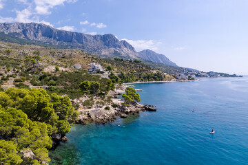 Fototapeta na wymiar Stunning landscape with rocky island and clean water on the beach,Brela,Makarska riviera,Dalmatia,Croatia,Europe