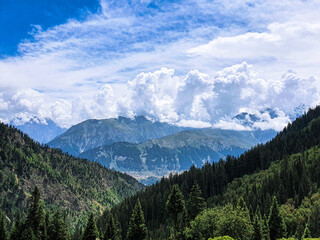 Top View of Mountains and Blue Clouds at The Desan Meadows Mountain in Kalam Valley