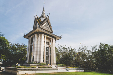 The memorial stupa of the Choeung Ek Killing Fields, containing some of the Khmer Rouge victims'...
