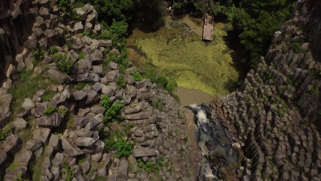 Aerial drone shot of prisms rocks dock
