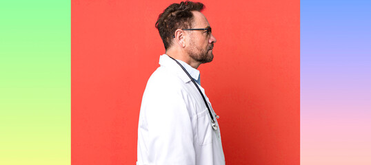 middle age man on profile view thinking, imagining or daydreaming. physician concept