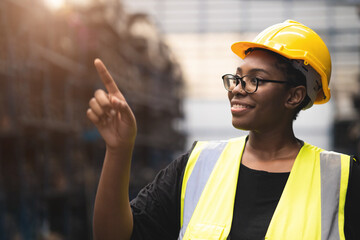 Black African smart women engineer worker finger point counting stock in factory industry warehouse...