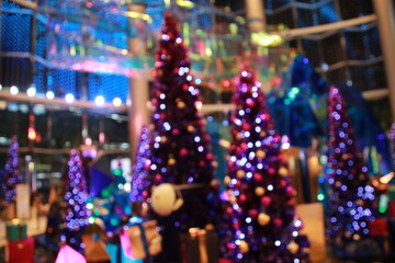 purple neon Christmas tree with decoration gift box  