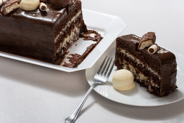 chocolate prestige cake, coconut and condensed milk , cake slice on a plate