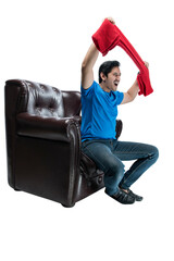 Asian man with a scarf sitting on the couch with an excited expression