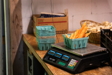 Carrots being weighed on scale
