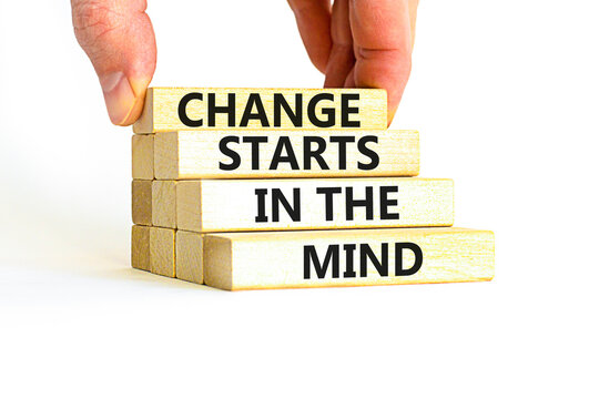 Change starts in the mind symbol. Concept words Change starts in the mind on wooden blocks on a beautiful white table white background. Business, motivational and change starts in the mind concept.