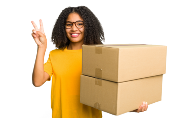 Young african american woman moving to other house while picking up a box full of things isolated showing number two with fingers.