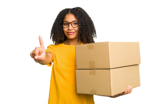 Young african american woman moving to other house while picking up a box full of things isolated showing number one with finger.