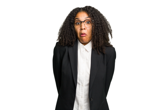 Young african american business woman isolated shrugs shoulders and open eyes confused.