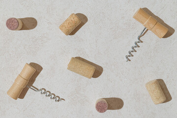 Creative pattern made of corkscrew and cork of wine on pastel background with shadows. Date, party...