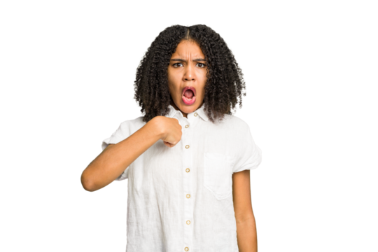 Young african american woman isolated surprised pointing with finger, smiling broadly.