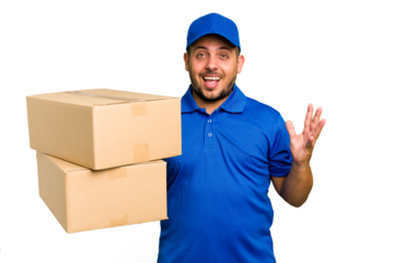 Delivery caucasian man isolated receiving a pleasant surprise, excited and raising hands.