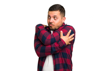 Young caucasian man isolated hugs, smiling carefree and happy.