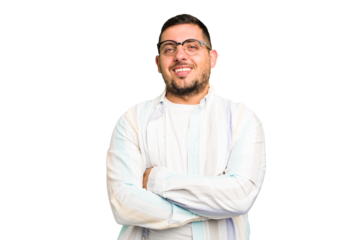 Young caucasian man isolated who feels confident, crossing arms with determination.