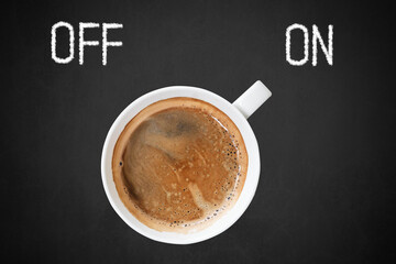 Cup of Coffee on Chalkboard with Off and On Text.