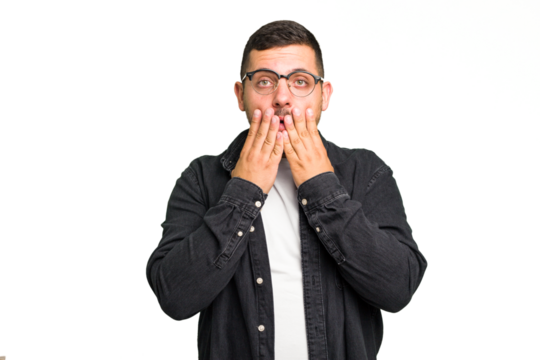 Young caucasian man isolated shocked, covering mouth with hands, anxious to discover something new.