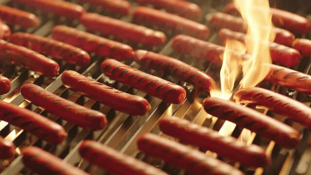 sausages being toasted in slow motion