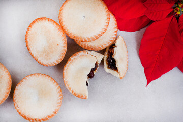 Christmas fruit mince pies on gray surface with lots of copy space
