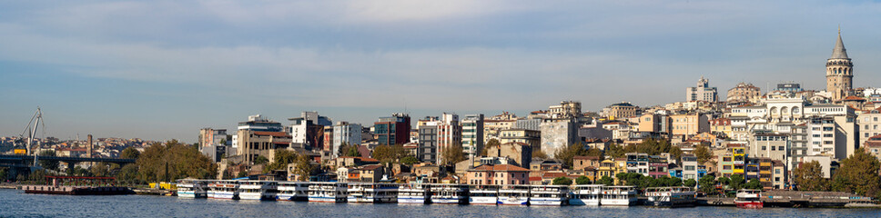 Fototapeta na wymiar Panoramic view of Karaköy Pier ferry landing on the Golden Horn, east of the Galata Bridge