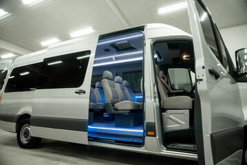 comfortable passenger bus interior with upholstered seats

