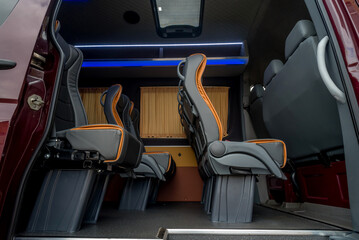 comfortable passenger bus interior with upholstered seats
