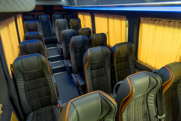 comfortable passenger bus interior with upholstered seats

