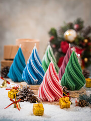 Christmas Candle. New Year's composition with candle in the shape of a Christmas tree. Candles made of natural wax.