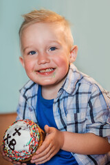 little child playing with toy