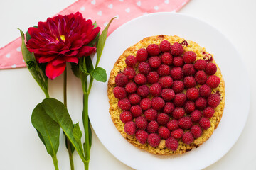 bright raspberry cake on a plate