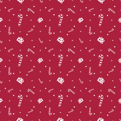 Christmas seamless pattern with hearts, candy, ornaments, and gifts