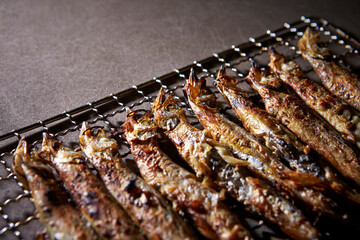 grilled fish on the grill - obrazy, fototapety, plakaty