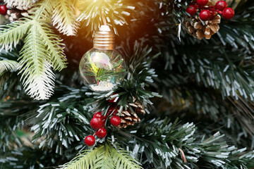 Obraz na płótnie Canvas Christmas.Decorated Christmas tree background.Christmas tree with decorations on blurred lights background. 