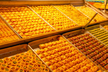 Traditional Turkish dessert baklawa in different flavors and styles in the Egyptian bazaar in Istanbul