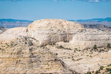 High angle view of cliff butte mesa canyon formations on highway 12 scenic road byway in Grand Staircase Escalante National Monument in Utah summer with bright white rock