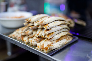 Best Street Food in Istanbul. Preparing the famous Balik Ekmek or Fish Sandwich