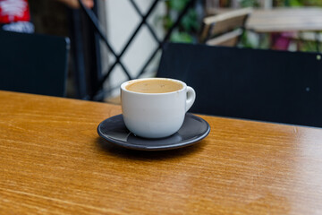 A cup of freshly brewed espresso served on a street in Istanbul