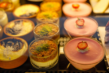 Various types of cakes in a pastry shop for sale
